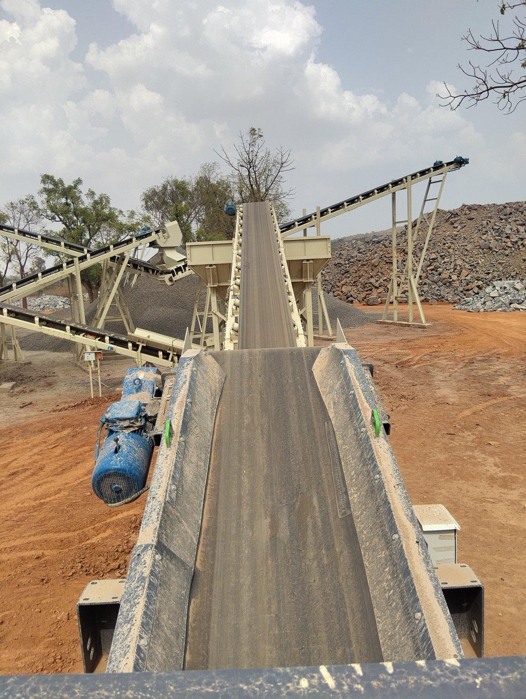 Material on conveyor belt heading to stockpile