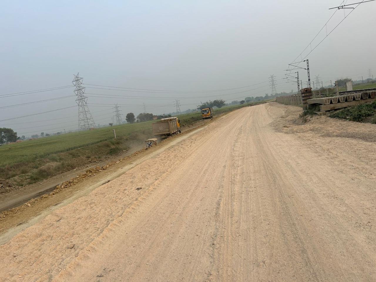 Railway bed compaction complete — track ready for ballast
