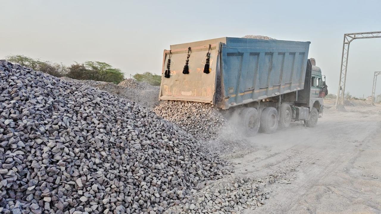 Granix Tech Solutions — bulk aggregate dispatch by 22-wheeler tipper at active project site