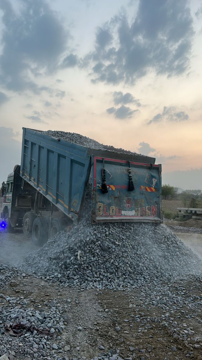 Tipper dumping crushed aggregate